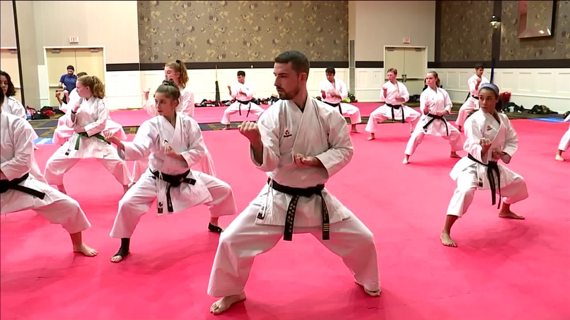 World karate champ shares his skills with other martial arts students